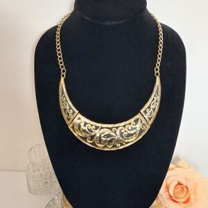 Gold tone black enamel bib collar necklace